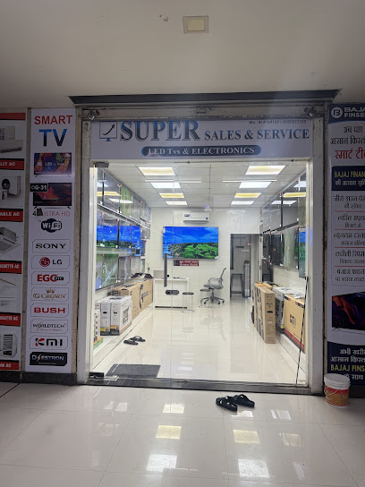 Super Sales & Services electronics showroom storefront in Surat
